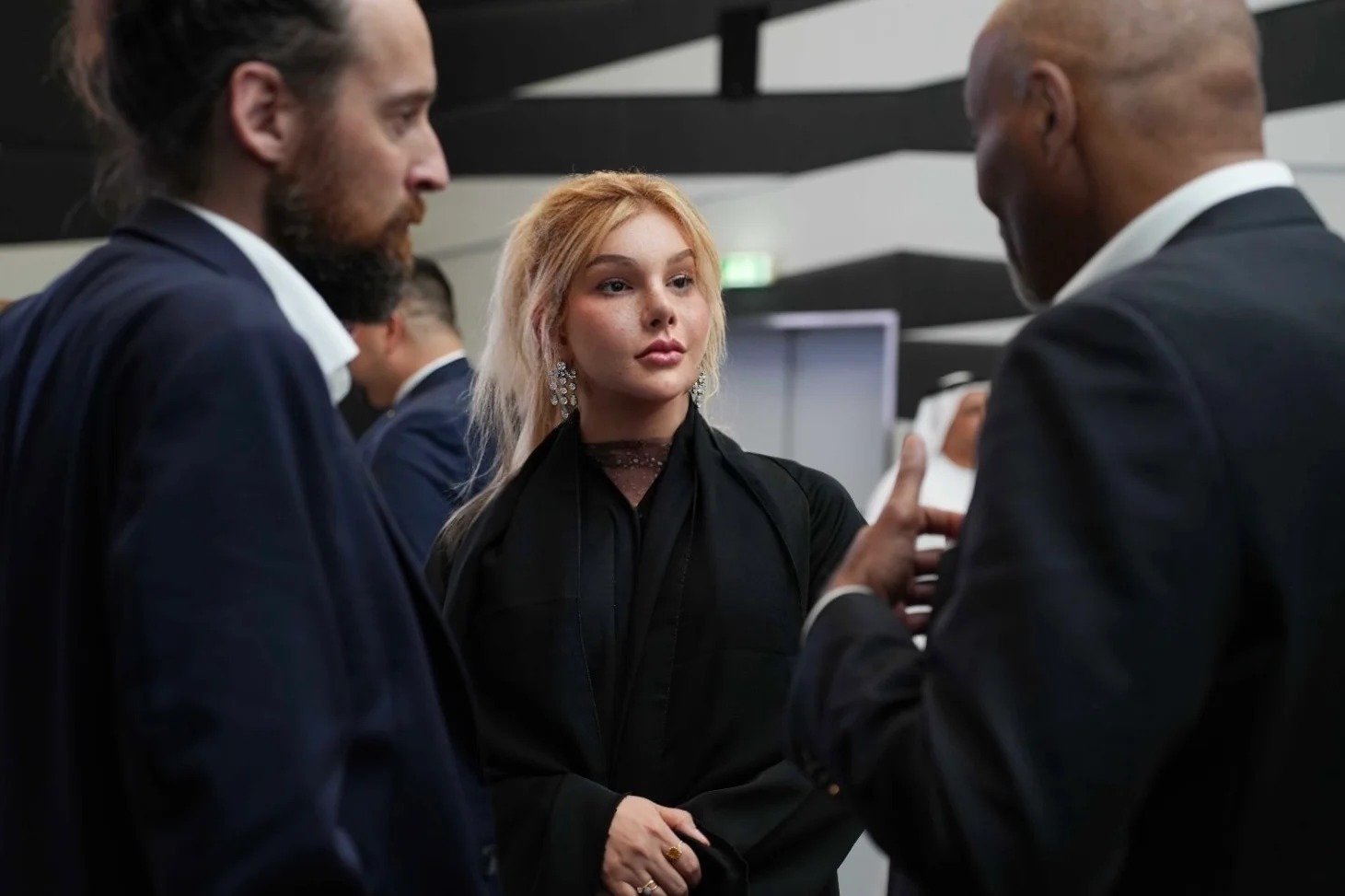 Lady Elizabeth Kelly in private advisory conversation at an international forum