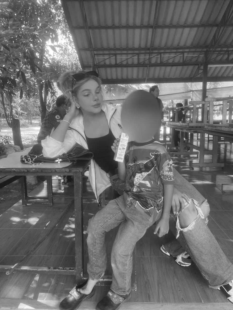 Sharing a drink with a child